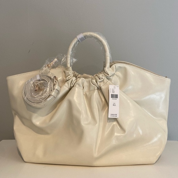 Anthropologie Handbags - NWT Anthropologie Crème Patent Leather Half Moon Women's Shoulder Bag
